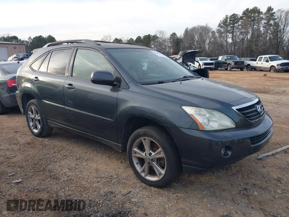 2007 Lexus RX 400h z VIN JTJGW31U372002594, wystawiony jako IAAI lot #41380924 z przebiegiem 243 928 mil mil oraz . Historia ofert i sprzedaży dostępna na DreamBid. Obrazek 1.