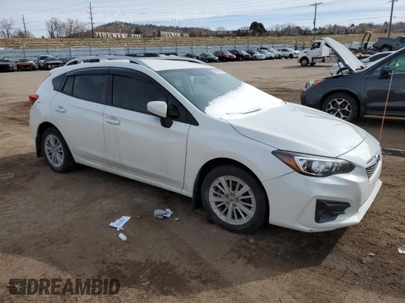 2017 Subaru Impreza Premium with VIN 4S3GTAB69H3738094, listed as a Copart auction lot 49854535 with 101,729 mi miles and Salvage title. Bid and sale history available at DreamBid. Image 4.