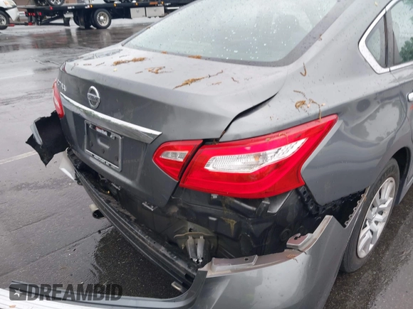 2017 Nissan Altima S with VIN 1N4AL3AP2HC212617, listed as a IAAI auction lot 41974656 with 115,869 mi miles and . Bid and sale history available at DreamBid. Image 18.