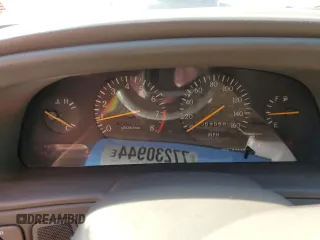 1994 Infiniti Q45 z VIN JNKNG01D3RM252218, wystawiony jako Copart lot #77230944 z przebiegiem 69 069 mil mil oraz Tytuł czysty. Historia ofert i sprzedaży dostępna na DreamBid. Obrazek 9.