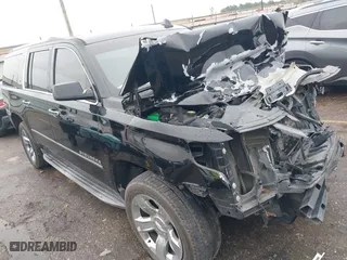 2015 Chevrolet Suburban LT with VIN 1GNSCJKC0FR591293, listed as a IAAI auction lot 41045198 with 186,126 mi miles. Bid and sale history available at carsss.com. Image 1.