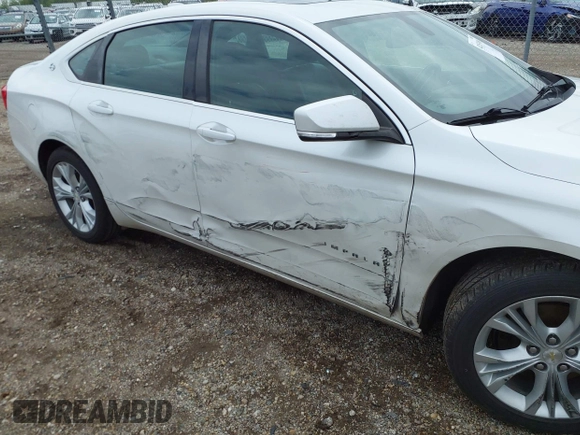 2015 Chevrolet Impala LT with VIN 1G1125S30FU140935, listed as a IAAI auction lot 42153988 with 147,828 mi miles and . Bid and sale history available at DreamBid. Image 6.