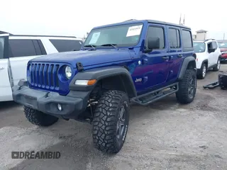 2019 Jeep Wrangler Unlimited Sport Altitude with VIN 1C4HJXDG6KW578572, listed as a IAAI auction lot 41921919 with 30,247 mi miles and . Bid and sale history available at DreamBid. Image 18.