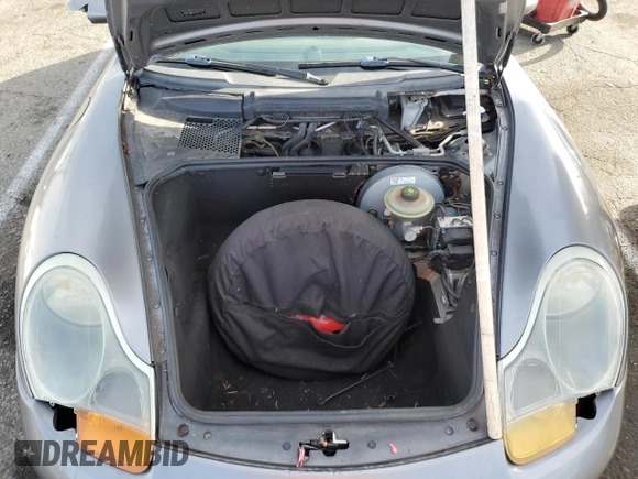 2002 Porsche Boxster z VIN WP0CA29862U621821, wystawiony jako Copart lot #85770484 z przebiegiem 121 843 mil mil oraz Czysty tytuł • Clean title. Historia ofert i sprzedaży dostępna na DreamBid. Obrazek 11.