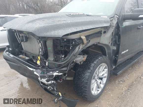 2021 Ram 1500 Laramie with VIN 1C6SRFJT6MN580803, listed as a IAAI auction lot 41207914 with 56,891 mi miles and . Bid and sale history available at DreamBid. Image 18.