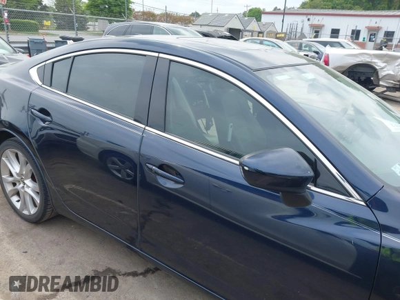2016 Mazda Mazda6 i Touring with VIN JM1GJ1V59G1402867, listed as a IAAI auction lot 41998212 with 135,724 mi miles. Bid and sale history available at carsss.com. Image 13.