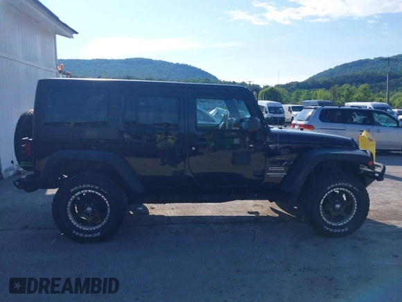 2013 Jeep Wrangler Unlimited Sport z VIN 1C4HJWDG9DL510121, wystawiony jako IAAI lot #42389944 z przebiegiem 84 390 mil mil oraz . Historia ofert i sprzedaży dostępna na DreamBid. Obrazek 13.
