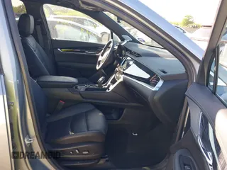 2025 Cadillac XT6 FWD Premium Luxury with VIN 1GYKPCRS3SZ118384, listed as a IAAI auction lot 41962391 with 6,946 mi miles. Bid and sale history available at carsss.com. Image 5.