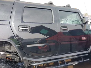 2006 Hummer H2 with VIN 5GRGN23U06H113353, listed as a IAAI auction lot 41476649 with 165,370 mi miles. Bid and sale history available at carsss.com. Image 13.