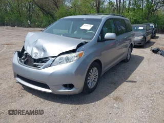 2014 Toyota Sienna XLE with VIN 5TDYK3DC9ES413283, listed as a IAAI auction lot 42091379 with 184,506 mi miles and . Bid and sale history available at DreamBid. Image 17.