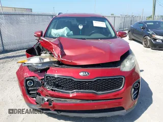 2018 Kia Sportage EX with VIN KNDPN3ACXJ7423171, listed as a IAAI auction lot 41997356 with 84,947 mi miles and . Bid and sale history available at DreamBid. Image 6.