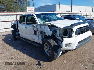 2013 Toyota Tacoma PreRunner with VIN 3TMKU4HN8DM038566, listed as a IAAI auction lot 41296386 with 153,240 mi miles and . Bid and sale history available at DreamBid. Image 1.