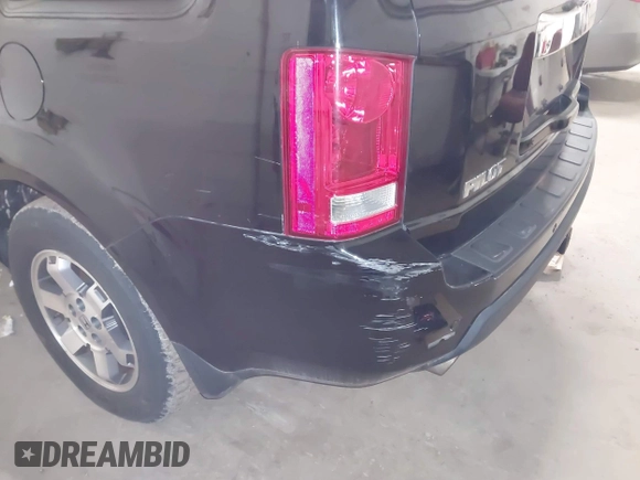 2009 Honda Pilot Touring with VIN 5FNYF48939B041166, listed as a IAAI auction lot 42098397 with 228,305 mi miles and . Bid and sale history available at carsss.com. Image 6.