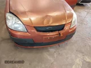 2009 Kia Rio LX with VIN KNADE223796547229, listed as a IAAI auction lot 41947371 with 153,061 mi miles and . Bid and sale history available at DreamBid. Image 6.