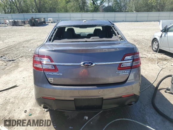 2013 Ford Taurus Limited z VIN 1FAHP2F81DG210357, wystawiony jako Copart lot #56235805 z przebiegiem 81 656 mil mil oraz Nie do naprawy • Non repairable. Historia ofert i sprzedaży dostępna na DreamBid. Obrazek 6.