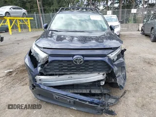 2023 Toyota RAV4 XLE with VIN JTMP1RFV1PD095688, listed as a IAAI auction lot 41874720 with 59,737 mi miles. Bid and sale history available at carsss.com. Image 12.