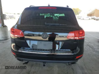 2013 Volkswagen Touareg Lux with VIN WVGEF9BPXDD001489, listed as a Copart auction lot 55898945 with 96,477 mi miles and Clean Title. Bid and sale history available at DreamBid. Image 6.