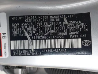 2007 Toyota Avalon XL with VIN 4T1BK36B57U174223, listed as a IAAI auction lot 41910541 with 220,304 mi miles. Bid and sale history available at carsss.com. Image 9.