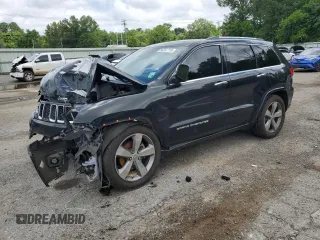 2015 Jeep Grand Cherokee Overland z VIN 1C4RJFCG5FC848219, wystawiony jako Copart lot #58357715 z przebiegiem 254 155 mil mil oraz Szkoda całkowita • Salvage title. Historia ofert i sprzedaży dostępna na DreamBid. Obrazek 1.
