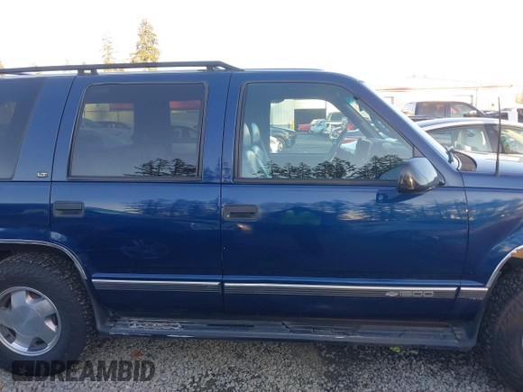 1997 Chevrolet Tahoe z VIN 1GNEK13R4VJ418974, wystawiony jako IAAI lot #41560411 z przebiegiem 198 170 mil mil oraz . Historia ofert i sprzedaży dostępna na DreamBid. Obrazek 13.