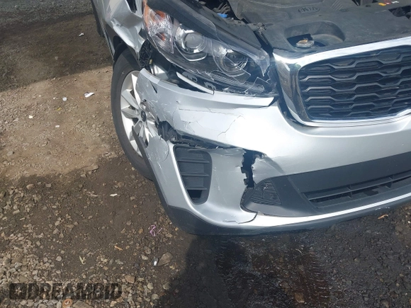 2019 Kia Sorento LX z VIN 5XYPGDA58KG482726, wystawiony jako IAAI lot #42192199 z przebiegiem 79 545 mil mil oraz . Historia ofert i sprzedaży dostępna na DreamBid. Obrazek 6.