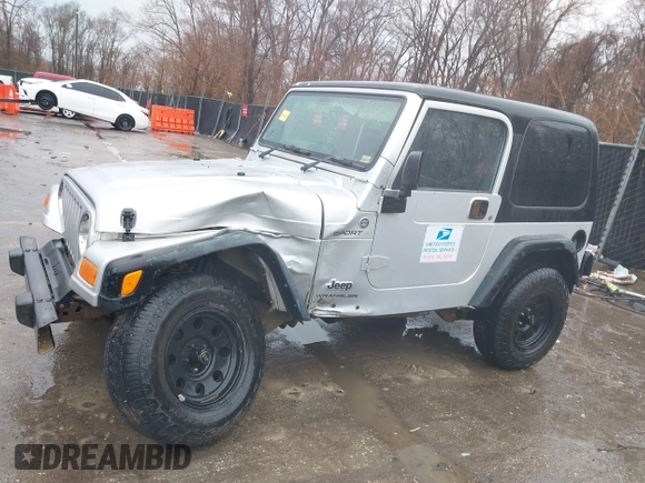 2006 Jeep Wrangler Sport Right Hand Drive with VIN 1J4F449SX6P764491, listed as a IAAI auction lot 41709726 with 290,798 mi miles. Bid and sale history available at carsss.com. Image 14.
