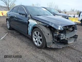 2013 Cadillac ATS z VIN 1G6AA5RA3D0123990, wystawiony jako IAAI lot #41965373 z przebiegiem 145 832 mil mil oraz . Historia ofert i sprzedaży dostępna na DreamBid. Obrazek 1.