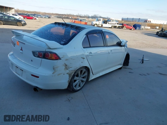 2014 Mitsubishi Lancer GT with VIN JA32U8FWXEU023081, listed as a IAAI auction lot 41609349 with 1 mi miles. Bid and sale history available at carsss.com. Image 4.