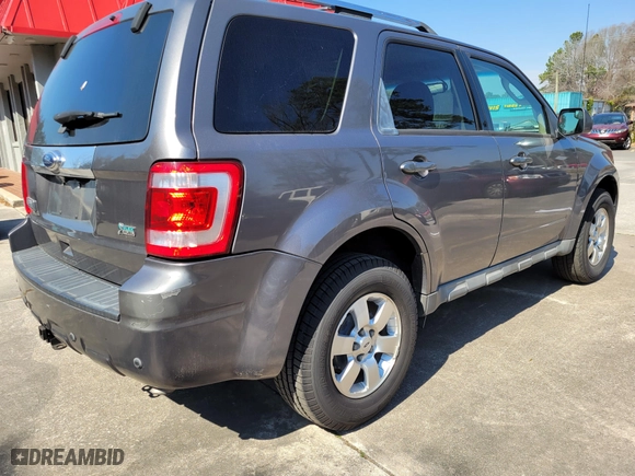 2011 Ford Escape Limited with VIN 1FMCU0E73BKA47257, listed as a IAAI auction lot 41707062 with 187,836 mi miles. Bid and sale history available at carsss.com. Image 4.