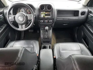 2015 Jeep Patriot High Altitude with VIN 1C4NJRFB2FD396806, listed as a Copart auction lot 57651155 with 130,357 mi miles and Salvage title. Bid and sale history available at DreamBid. Image 8.