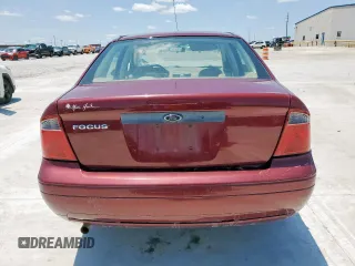 2007 Ford Focus S z VIN 1FAFP34NX7W324146, wystawiony jako Copart lot #59006755 z przebiegiem 160 398 mil mil oraz Szkoda całkowita • Salvage title. Historia ofert i sprzedaży dostępna na DreamBid. Obrazek 6.