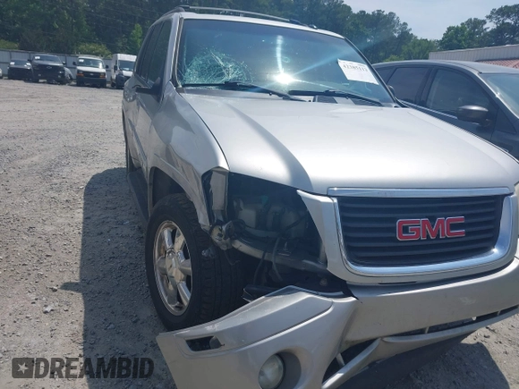 2004 GMC Envoy SLT with VIN 1GKDS13S742230325, listed as a IAAI auction lot 42385113 with 177,989 mi miles and . Bid and sale history available at DreamBid. Image 6.