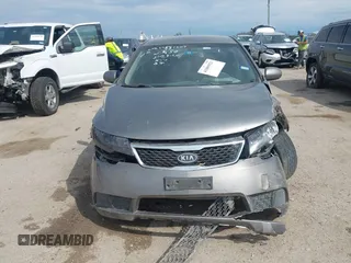 2012 Kia Forte EX with VIN KNAFU4A25C5492664, listed as a IAAI auction lot 41889921 with 163,334 mi miles and . Bid and sale history available at DreamBid. Image 12.