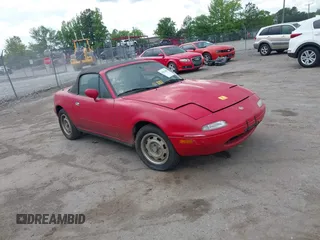 1996 Mazda MX-5 Miata z VIN JM1NA353XT0712415, wystawiony jako IAAI lot #42214283 z przebiegiem 55 027 mil mil oraz . Historia ofert i sprzedaży dostępna na DreamBid. Obrazek 1.