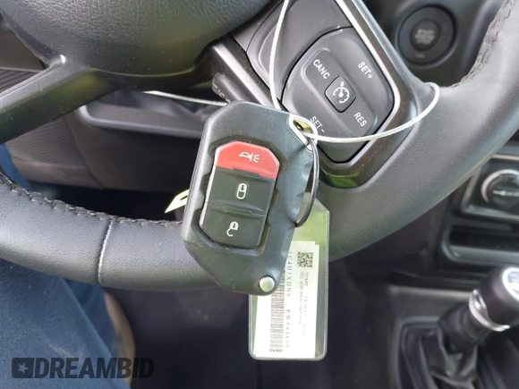 2023 Jeep Wrangler Sport S with VIN 1C4HJXDN6PW599895, listed as a IAAI auction lot 42242107 with 53,980 mi miles and . Bid and sale history available at DreamBid. Image 11.