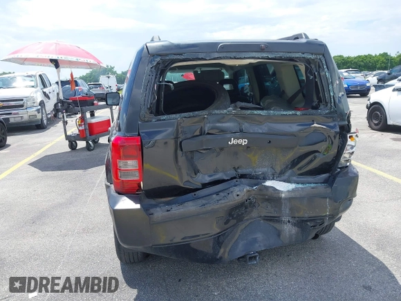 2009 Jeep Patriot Sport with VIN 1J4FT28BX9D140446, listed as a IAAI auction lot 40098694 with 202,342 mi miles and . Bid and sale history available at DreamBid. Image 12.
