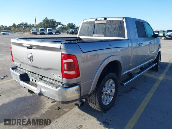 2019 Ram 2500 Laramie with VIN 3C6UR5NL5KG701954, listed as a IAAI auction lot 41030753 with 183,756 mi miles. Bid and sale history available at carsss.com. Image 4.