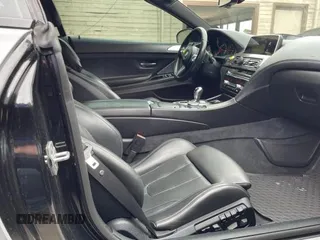 2016 BMW M6 z VIN WBS6G9C54GD932196, wystawiony jako Copart lot #53960063 z przebiegiem 46 162 mil mil oraz . Historia ofert i sprzedaży dostępna na DreamBid. Obrazek 5.
