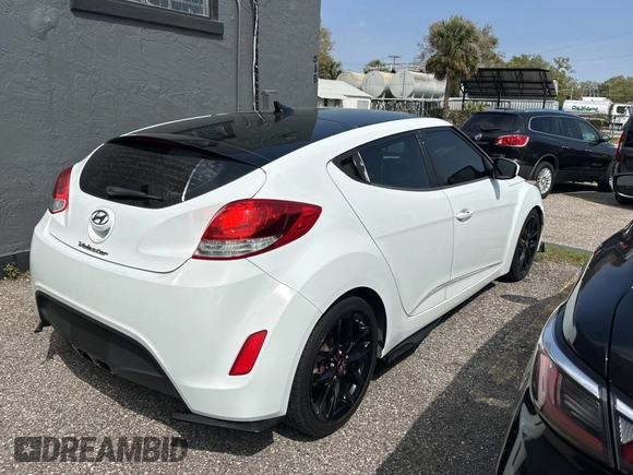 2012 Hyundai Veloster w/Gray Int с VIN KMHTC6AD6CU036826, выставлен на аукционе Copart как лот 48781135 с пробегом 169 498 миль миль и Чистый • Clean title. История ставок и продаж доступна на DreamBid. Изображение 4.