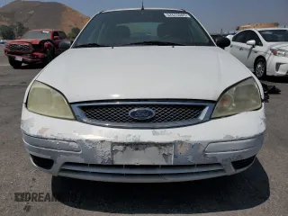 2007 Ford Focus S z VIN 1FAFP34NX7W106482, wystawiony jako Copart lot #57675245 z przebiegiem 170 237 mil mil oraz Szkoda całkowita • Salvage title. Historia ofert i sprzedaży dostępna na DreamBid. Obrazek 5.