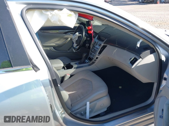 2011 Cadillac CTS Performance with VIN 1G6DJ5ED6B0128062, listed as a IAAI auction lot 42150038 with 245,293 mi miles and . Bid and sale history available at DreamBid. Image 5.