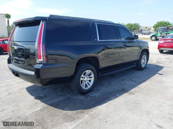 2018 Chevrolet Suburban LT with VIN 1GNSCHKC7JR111560, listed as a IAAI auction lot 41823175 with 136,751 mi miles. Bid and sale history available at carsss.com. Image 4.