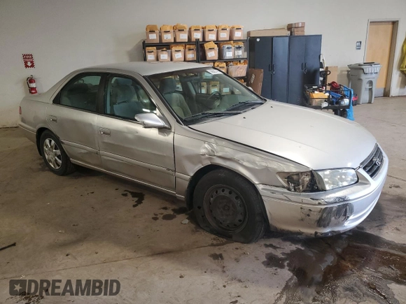 2001 Toyota Camry CE z VIN 4T1BG22K91U101946, wystawiony jako Copart lot #59685795 z przebiegiem 99 347 mil mil oraz Szkoda całkowita • Salvage title. Historia ofert i sprzedaży dostępna na DreamBid. Obrazek 4.