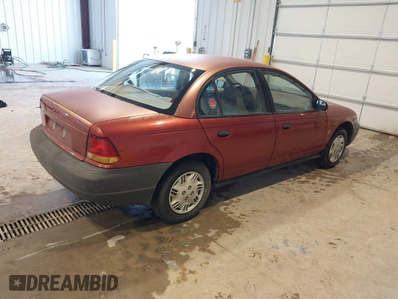 1996 Saturn SL with VIN 1G8ZG528XTZ192914, listed as a IAAI auction lot 41604499 with 126,180 mi miles. Bid and sale history available at carsss.com. Image 4.