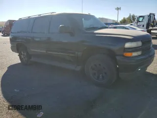 2005 Chevrolet Suburban LS with VIN 3GNEC16Z35G186832, listed as a Copart auction lot 79968144 with 237,942 mi miles and Salvage title. Bid and sale history available at DreamBid. Image 4.