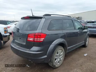 2020 Dodge Journey SE Value z VIN 3C4PDCAB2LT202088, wystawiony jako IAAI lot #41894515 z przebiegiem 97 564 mil mil oraz . Historia ofert i sprzedaży dostępna na DreamBid. Obrazek 4.