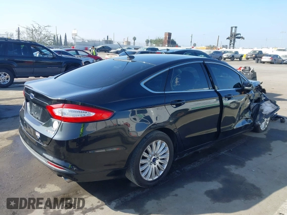 2013 Ford Fusion SE Hybrid with VIN 3FA6P0LU4DR325699, listed as a IAAI auction lot 41677237 with 129,004 mi miles. Bid and sale history available at carsss.com. Image 4.