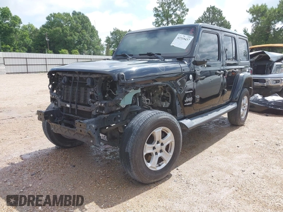 2019 Jeep Wrangler Unlimited Sahara with VIN 1C4HJXEN9KW514880, listed as a IAAI auction lot 42319437 with 70,186 mi miles and . Bid and sale history available at DreamBid. Image 2.