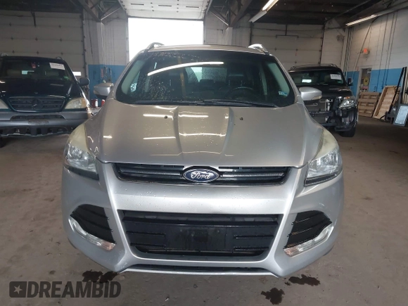 2015 Ford Escape Titanium z VIN 1FMCU9J96FUB23902, wystawiony jako IAAI lot #42497188 z przebiegiem 164 452 mil mil oraz . Historia ofert i sprzedaży dostępna na DreamBid. Obrazek 12.