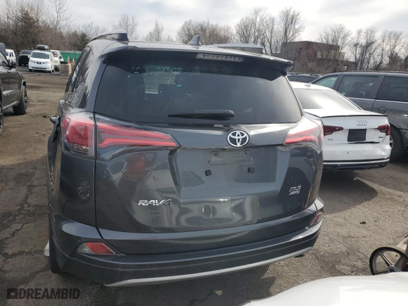 2017 Toyota RAV4 XLE with VIN JTMRFREV3HD198494, listed as a Copart auction lot 51052915 with 96,036 mi miles and Salvage Title. Bid and sale history available at carsss.com. Image 6.
